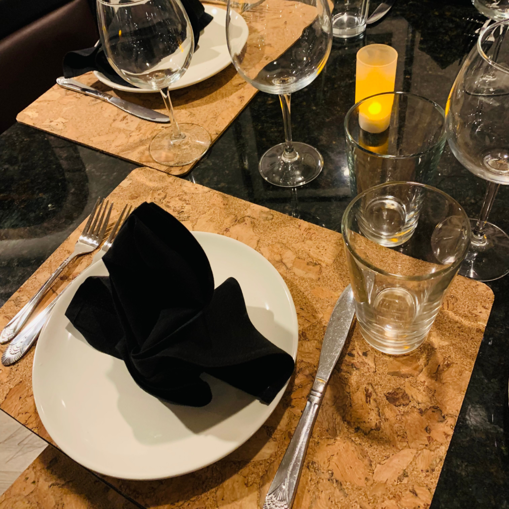 cork placemats with black napkin